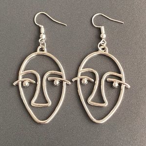 NEW Human Face Earrings in Silver color